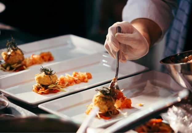 Chef plating food