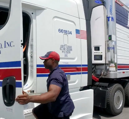 Worker getting into a customized truck
