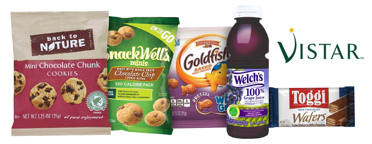 A variety of packaged snacks and drinks, including cookies, snack bites, Goldfish crackers, grape juice, and wafer bars, displayed on a white background with the Vistar logo.